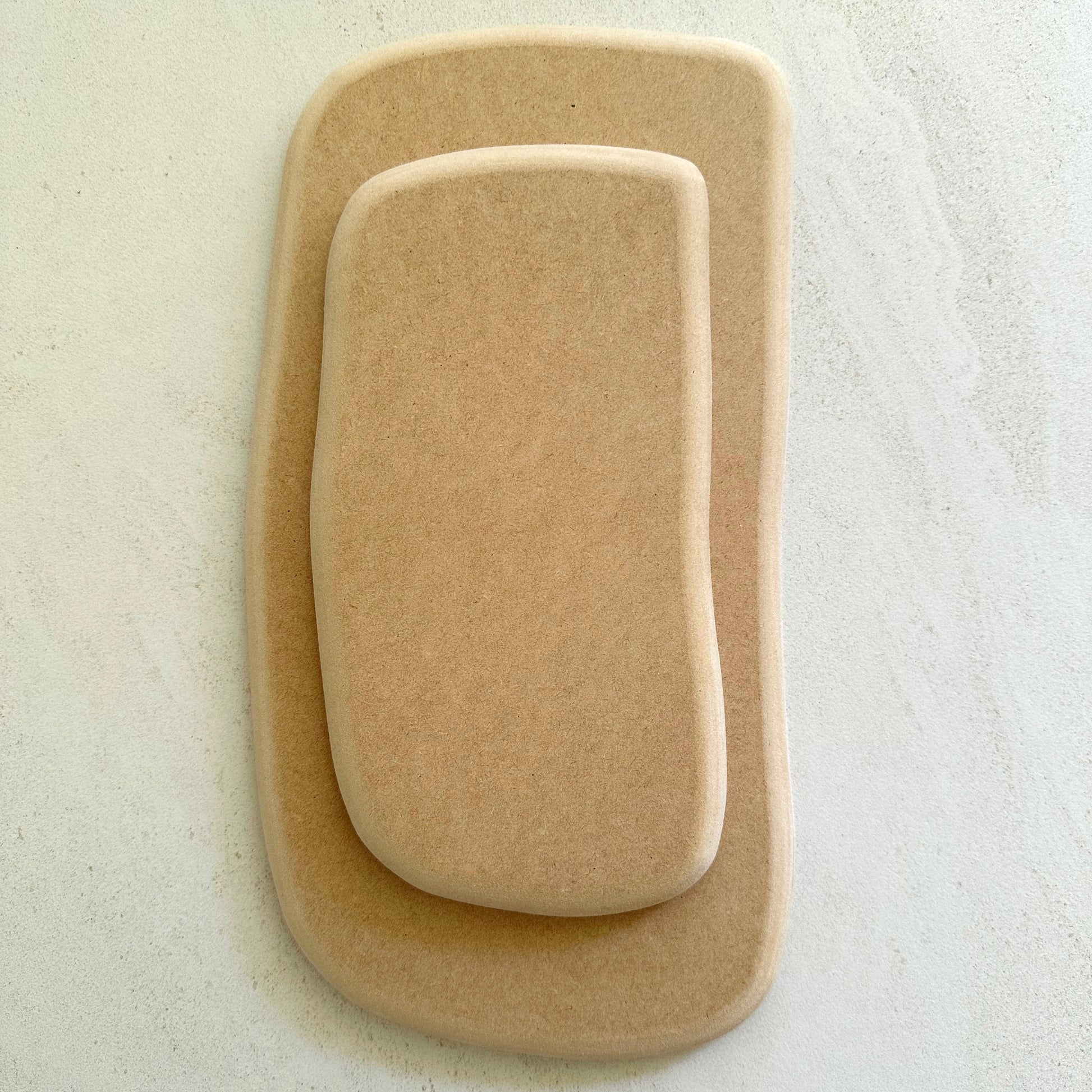 Rounded rectangular pottery form/drape mould with soft roundover edge. Available in two sizes and designed so you can nest the smaller size within the larger size