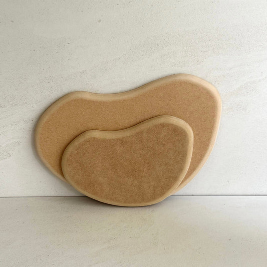 Bean-shaped pottery form drape mould with soft roundover edge. Available in two sizes.