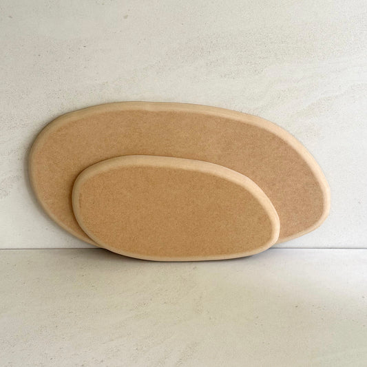 Irregular oval pottery form/drape mould with soft roundover edge. Available in two sizes.