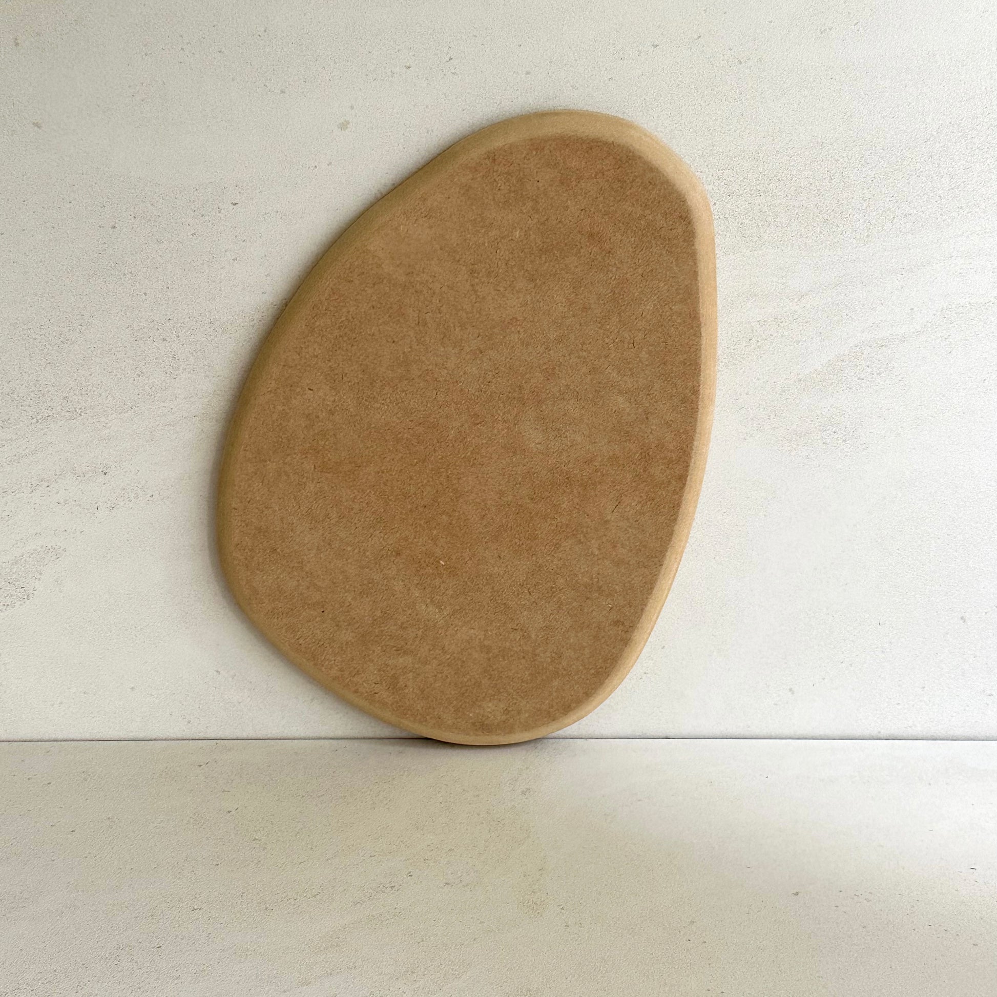 Rounded triangular oval pottery form/drape mould with soft roundover edge. Available in two sizes.