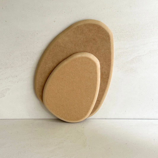 Rounded triangular oval pottery form/drape mould with soft roundover edge. Available in two sizes.