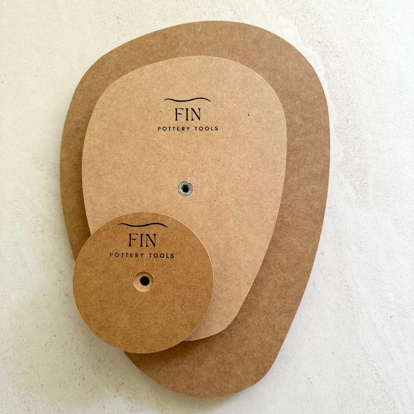 Rounded triangular oval pottery form/drape mould with soft roundover edge. Available in two sizes.