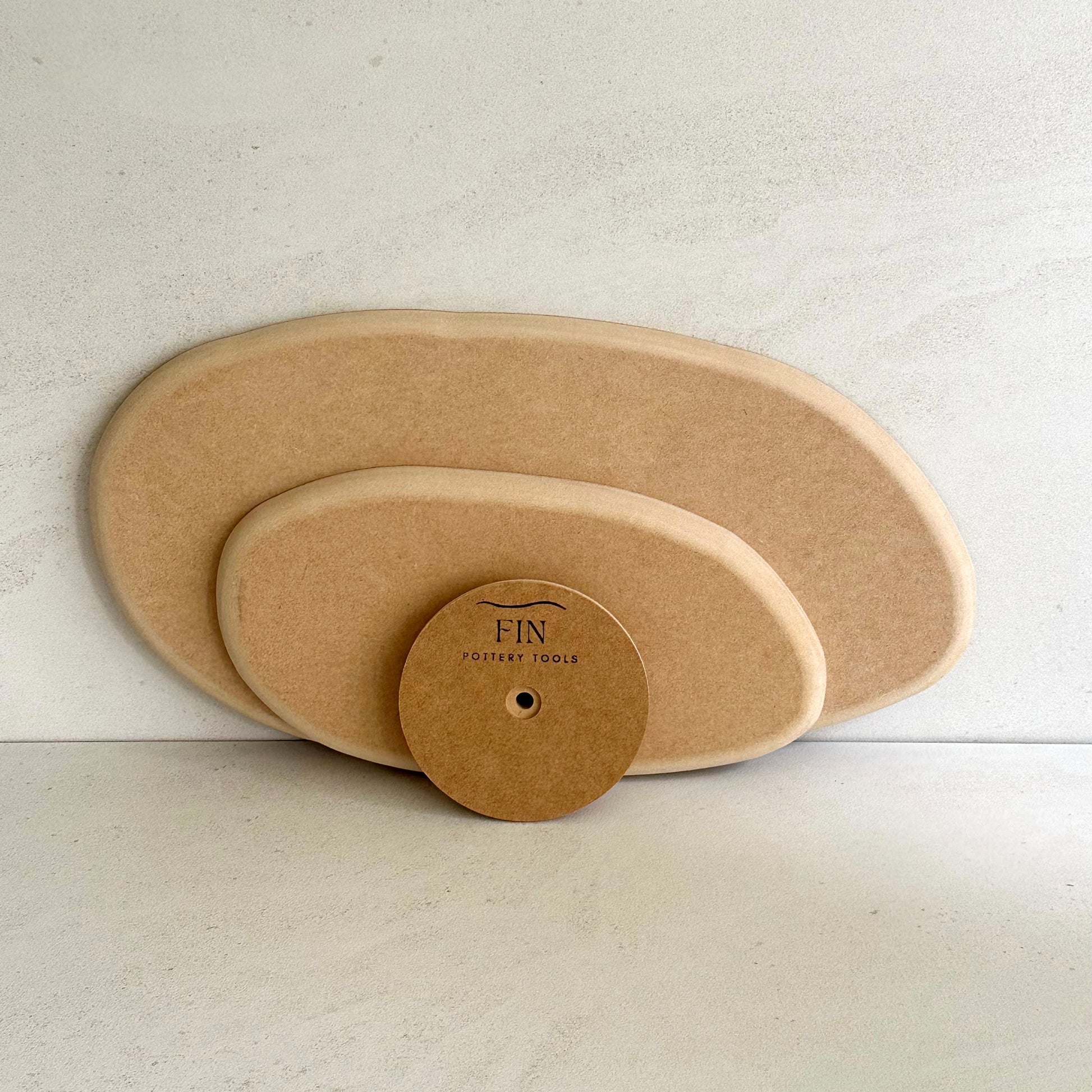 Irregular oval pottery form/drape mould with soft roundover edge. Available in two sizes.