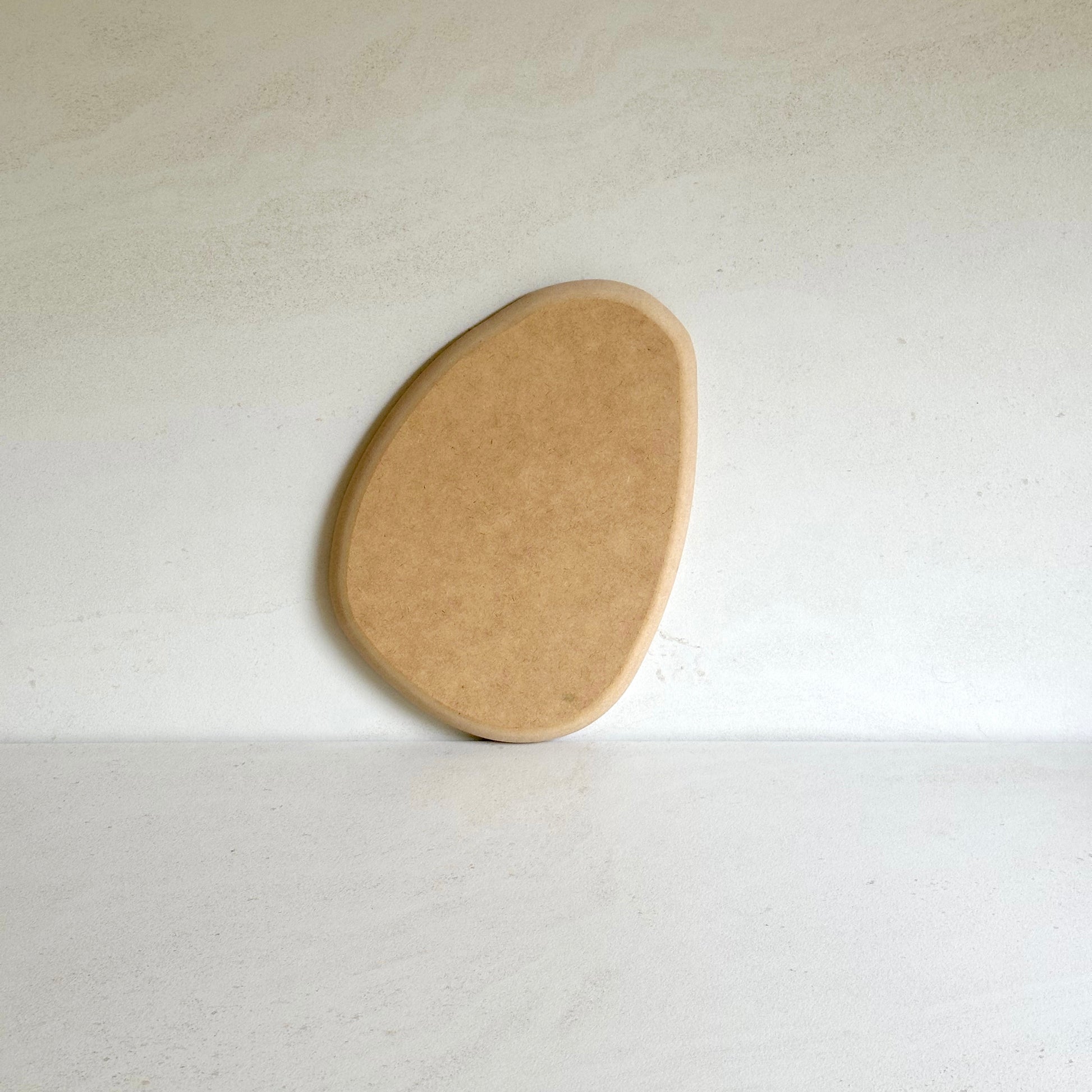 Rounded triangular oval pottery form/drape mould with soft roundover edge. Available in two sizes.