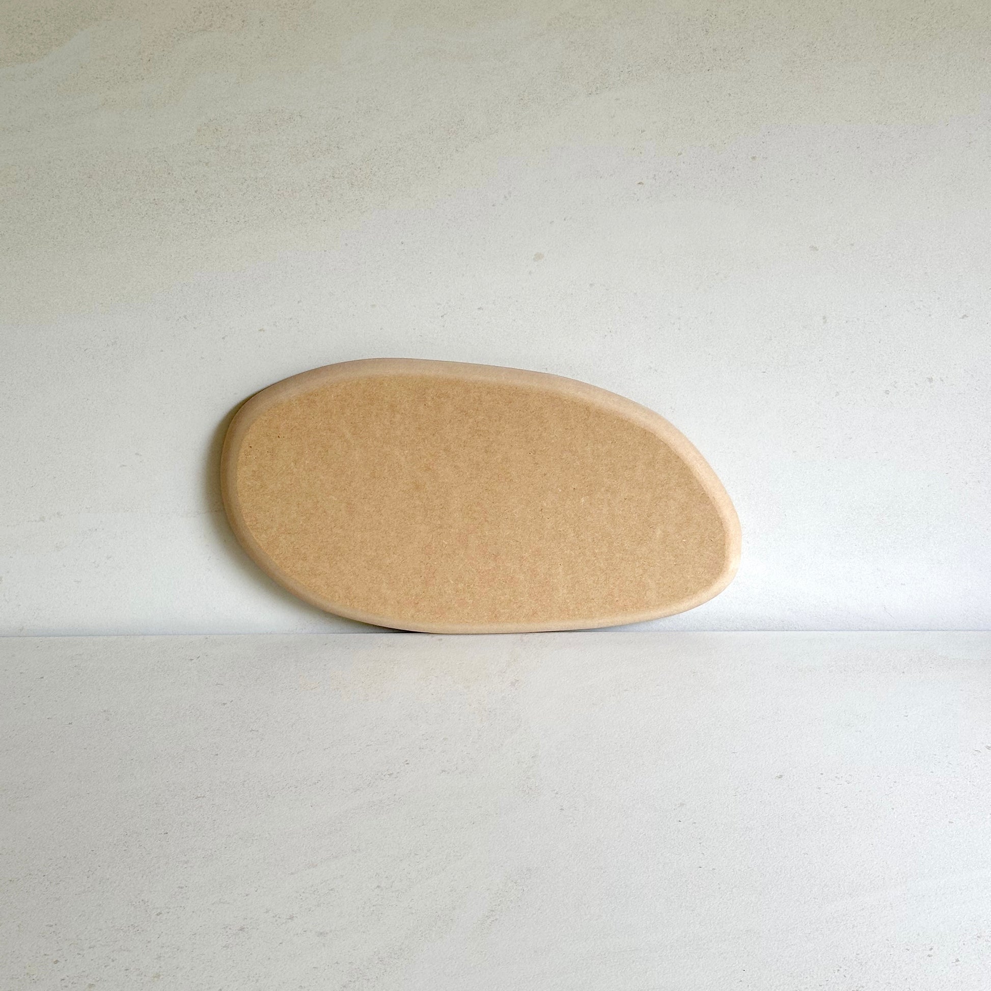 Irregular oval pottery form/drape mould with soft roundover edge. Available in two sizes.