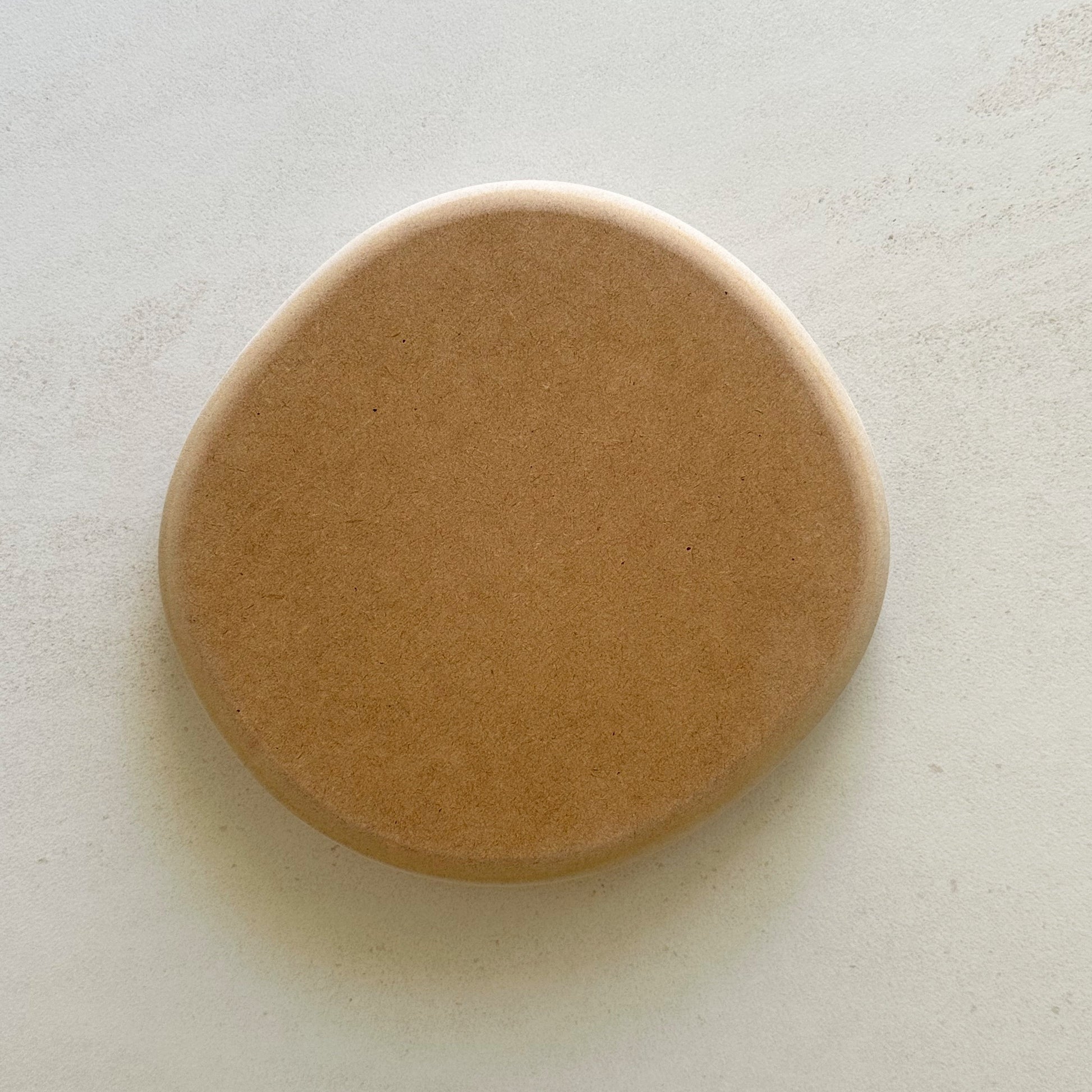 Irregular blate pottery form