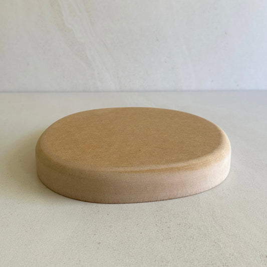 Irregular blate pottery form