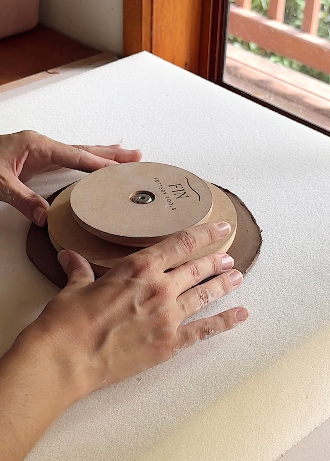 Using the foam push method to make a dish using Fin Pottery Tools pottery forms. 