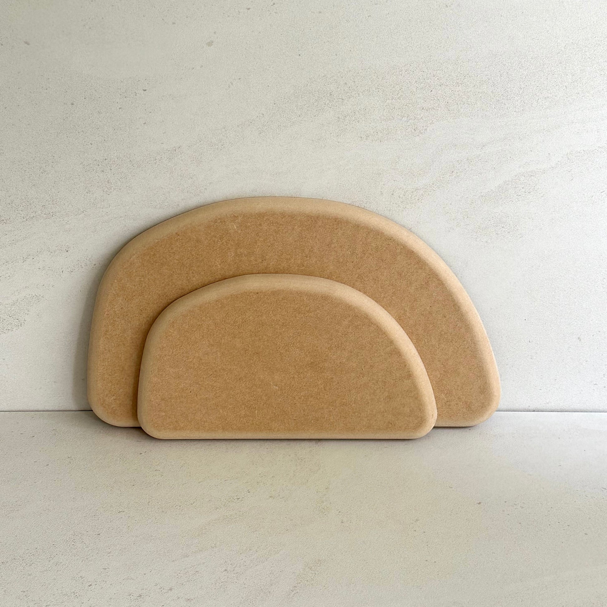 Semi-circle pottery form/drape mould with soft roundover edge. Available in two sizes.