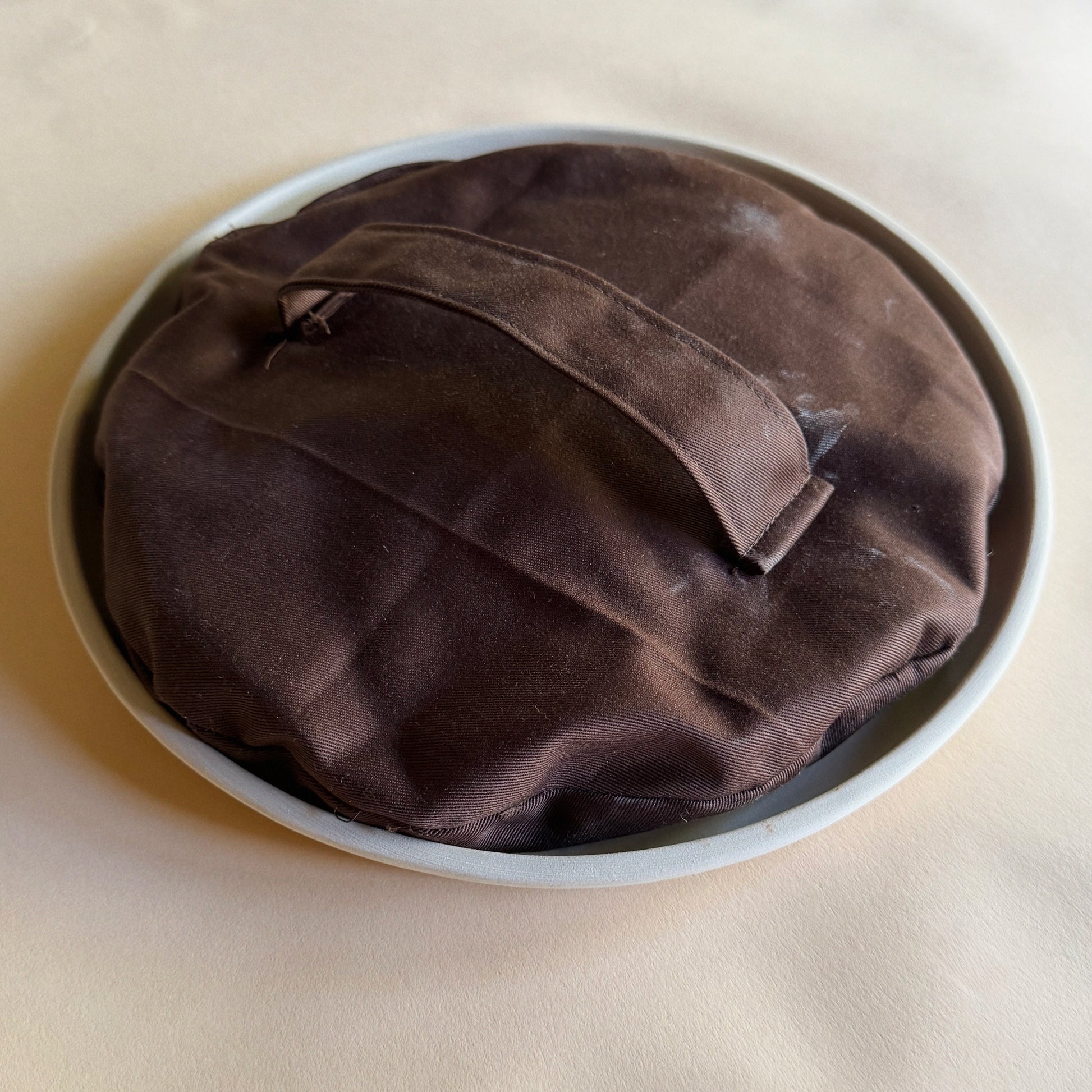 DIY sandbags on top of a plate to help dry flat