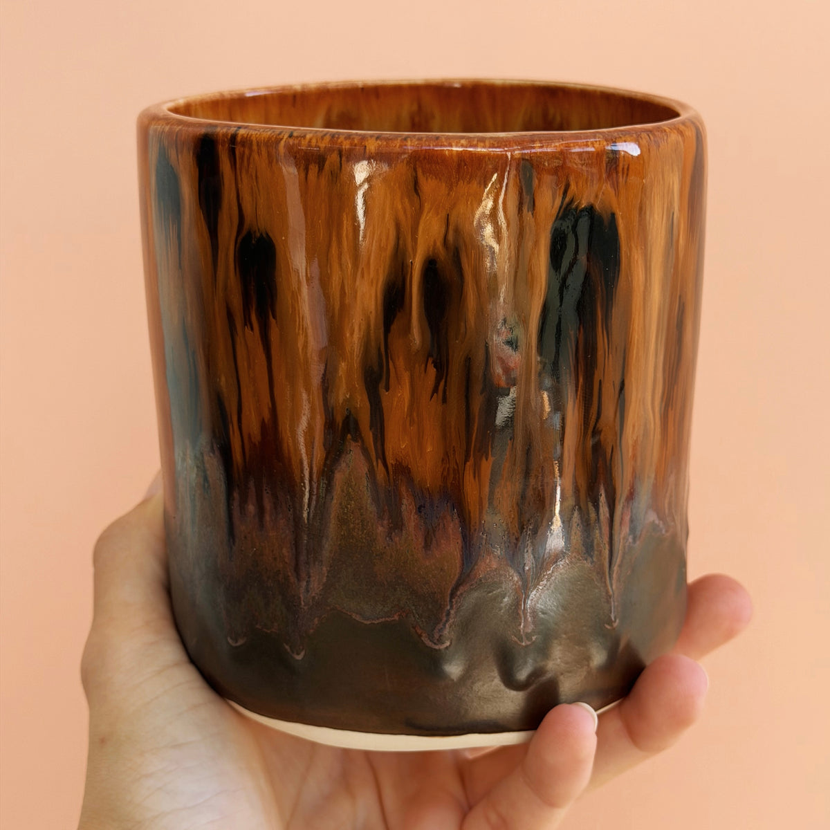 Earthy brown drippy glaze tumbler made with the Fin Pottery Tools Extra Large Tumbler Mould