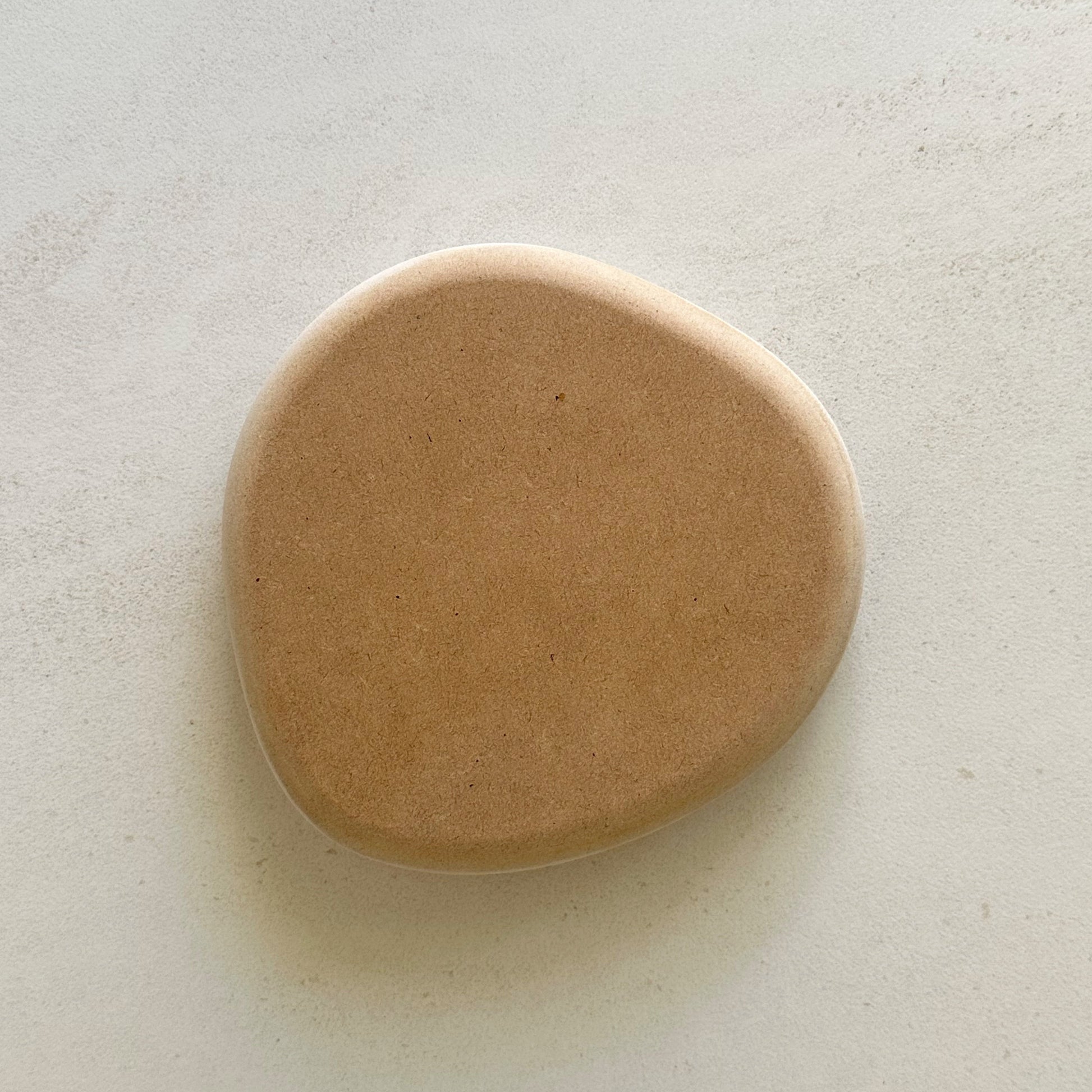 Irregular blate pottery form